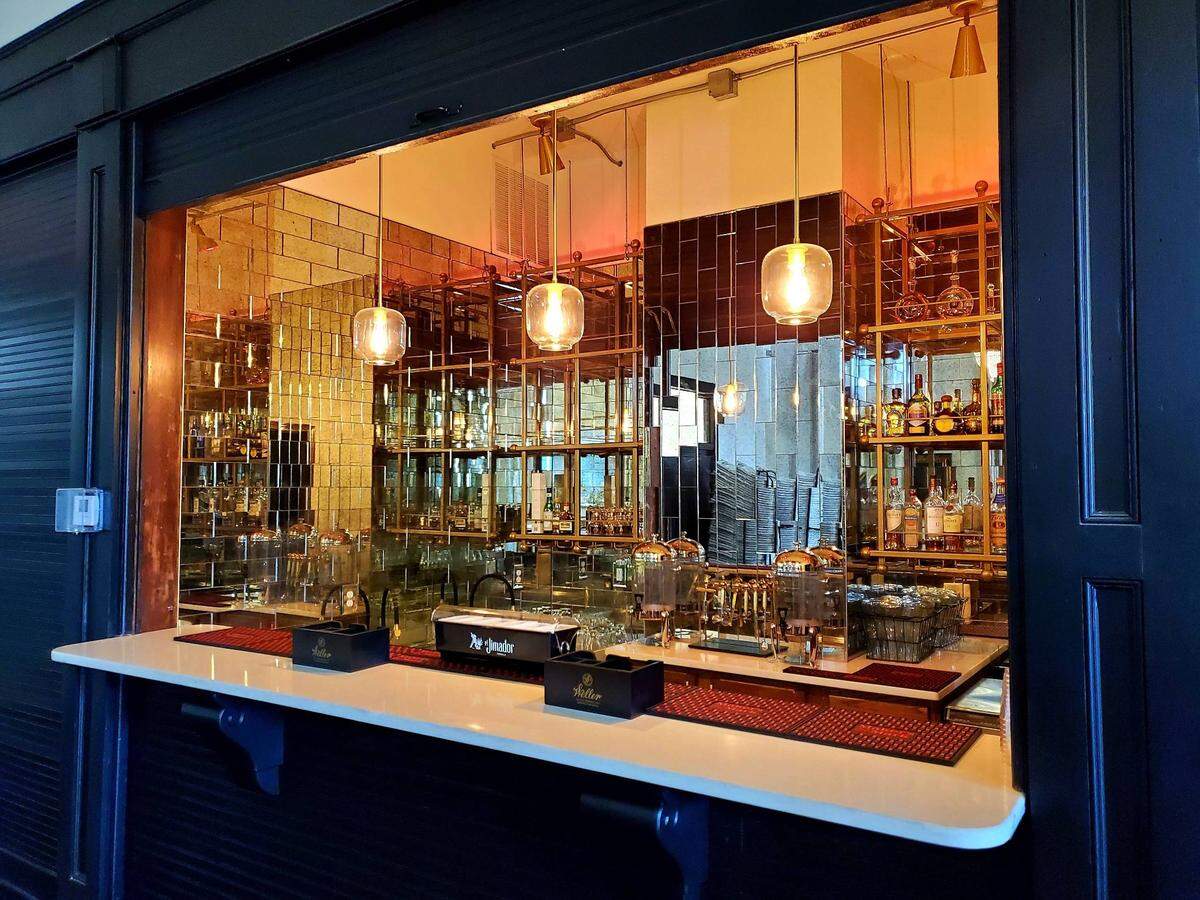 Odd Fellow Hall managing partners Cody Lonergan and Jimmy Vo designed a throwback bar for the venue and built it into what was once a storage area.