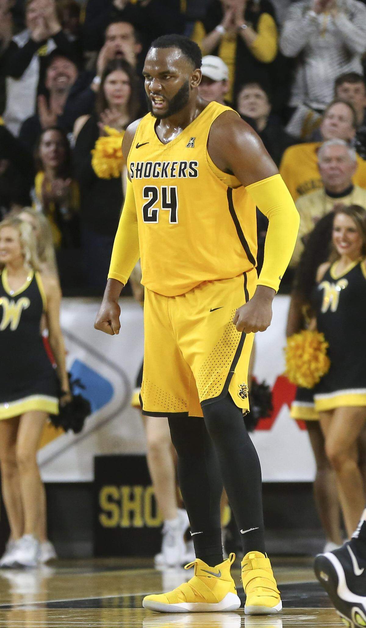 Wichita State center Shaquille Morris flexes his muscles against Tulsa during a game in January at Koch Arena.