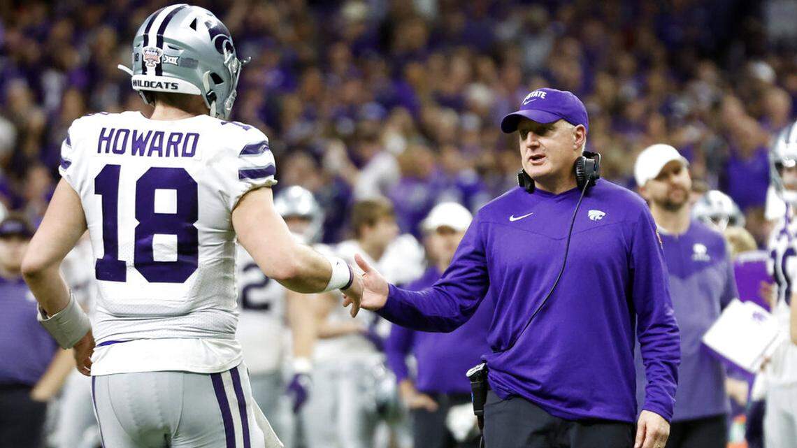 Kansas State quarterback Will Howard (18) celebrates with head coach Chris Klieman after throwing a touchdown pass against Alabama in the second half of the Sugar Bowl NCAA college football game Saturday, Dec. 31, 2022, in New Orleans. (AP Photo/Butch Dill)