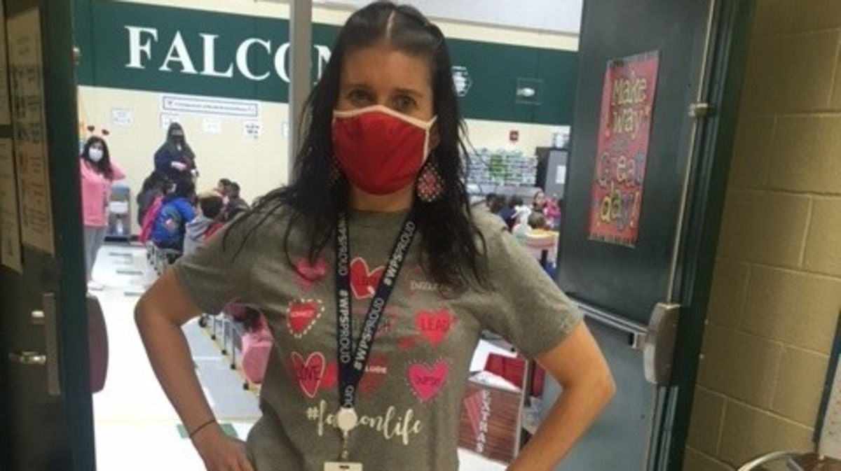 “It’s my goal the first month of school every year to learn all their names, what grade they’re in and who their teacher is,” says Jacqui Bellew of students at Jefferson Elementary School in Wichita.