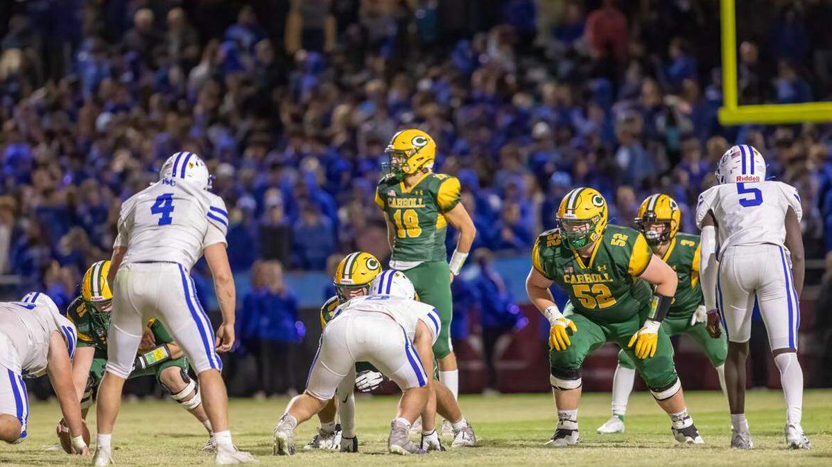 More than 8,600 fans were at Riverfront Stadium for a record-setting crowd to watch the Bishop Carroll football team defeat Kapaun Mt. Carmel 26-21 on Friday.