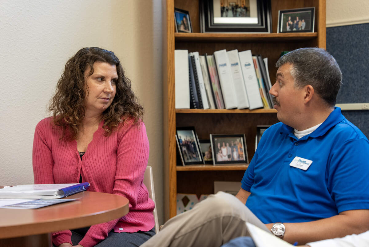 Pratt City Manager Regina Goff, left, and Mayor Kyle Farmer discuss the vote for a sales tax.
