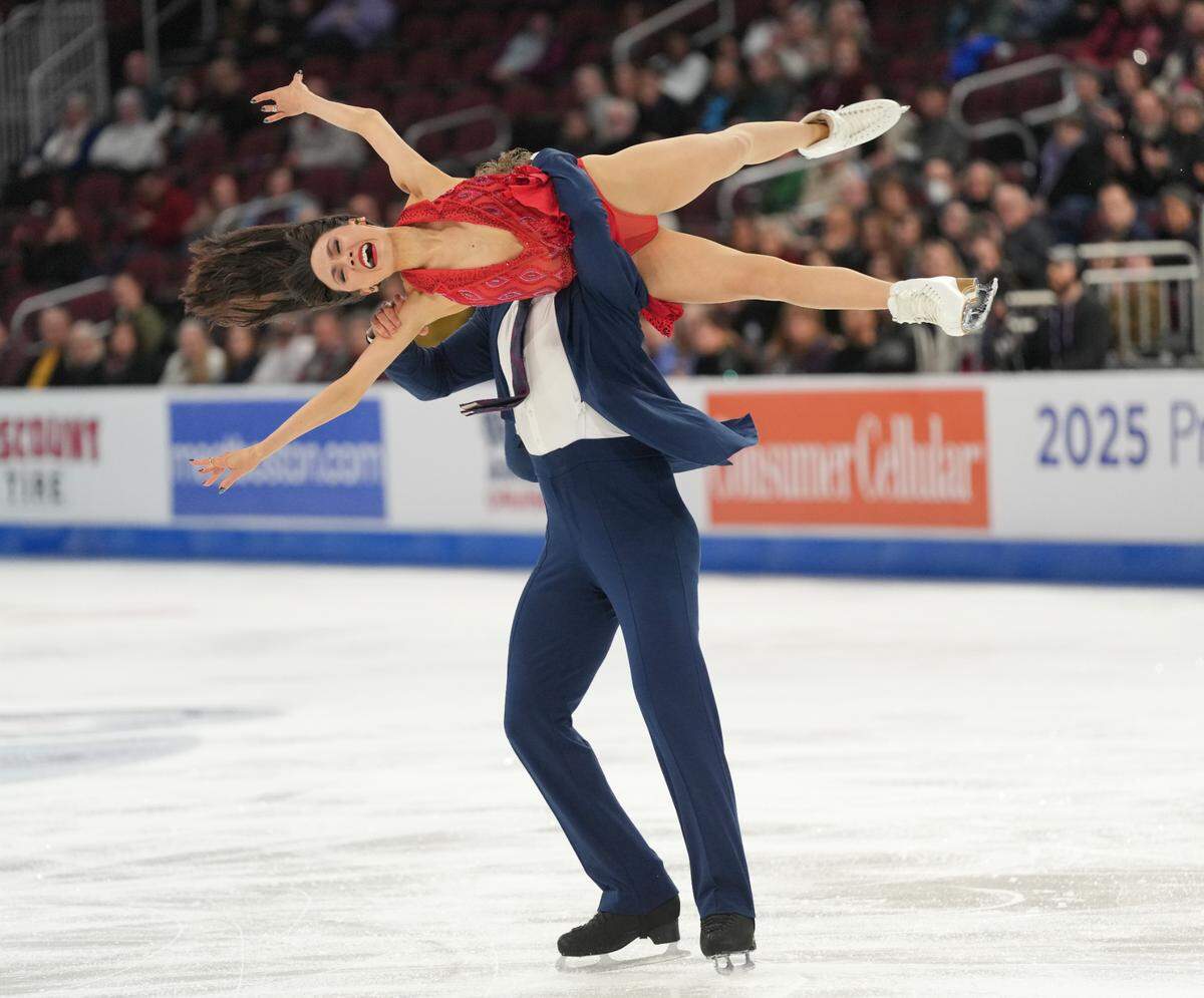 Madison Chock and Evan Bates perform during the ice dance rhythm dance competition at the U.S. figure skating championships at Intrust Bank Arena.