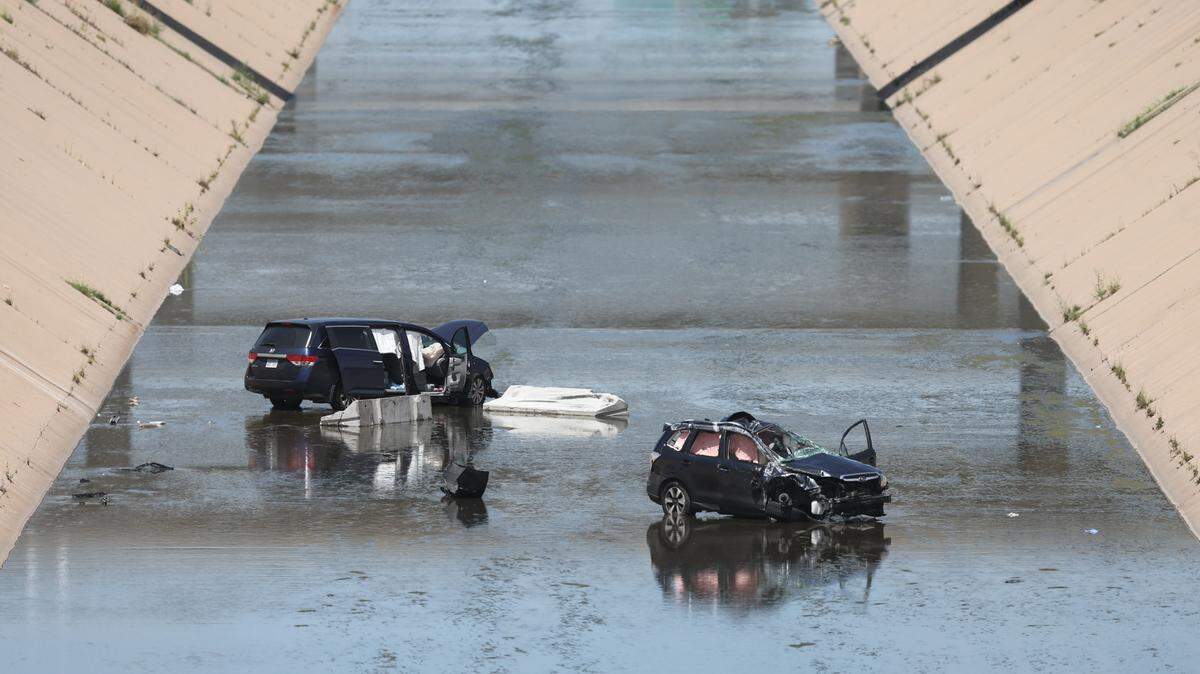 Several people were injured when two vehicles landed in the canal along I-135 near Lincoln on Monday afternoon.