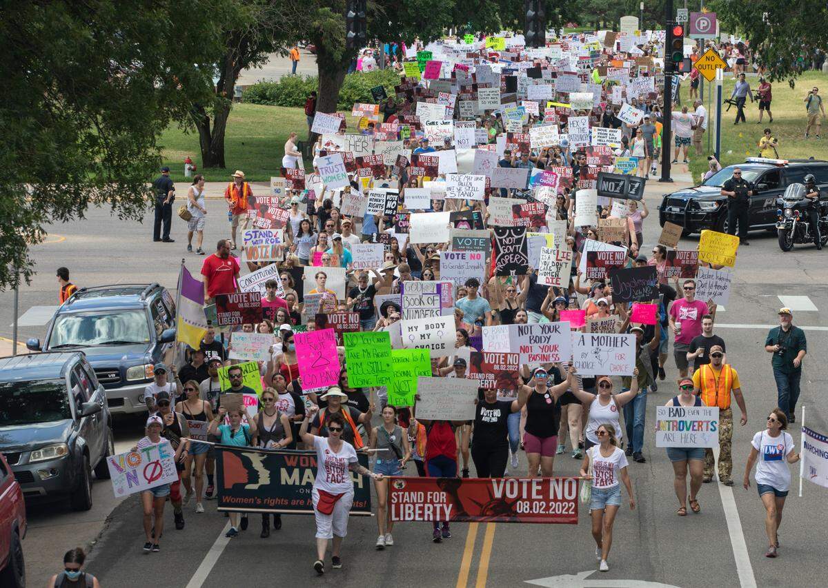 Dr. Sabrina Markese of Olathe walked in “vote no” rallies in Topeka and Wichita, shown here, as she let her pro-choice stance on abortion be known publicly for the first time.