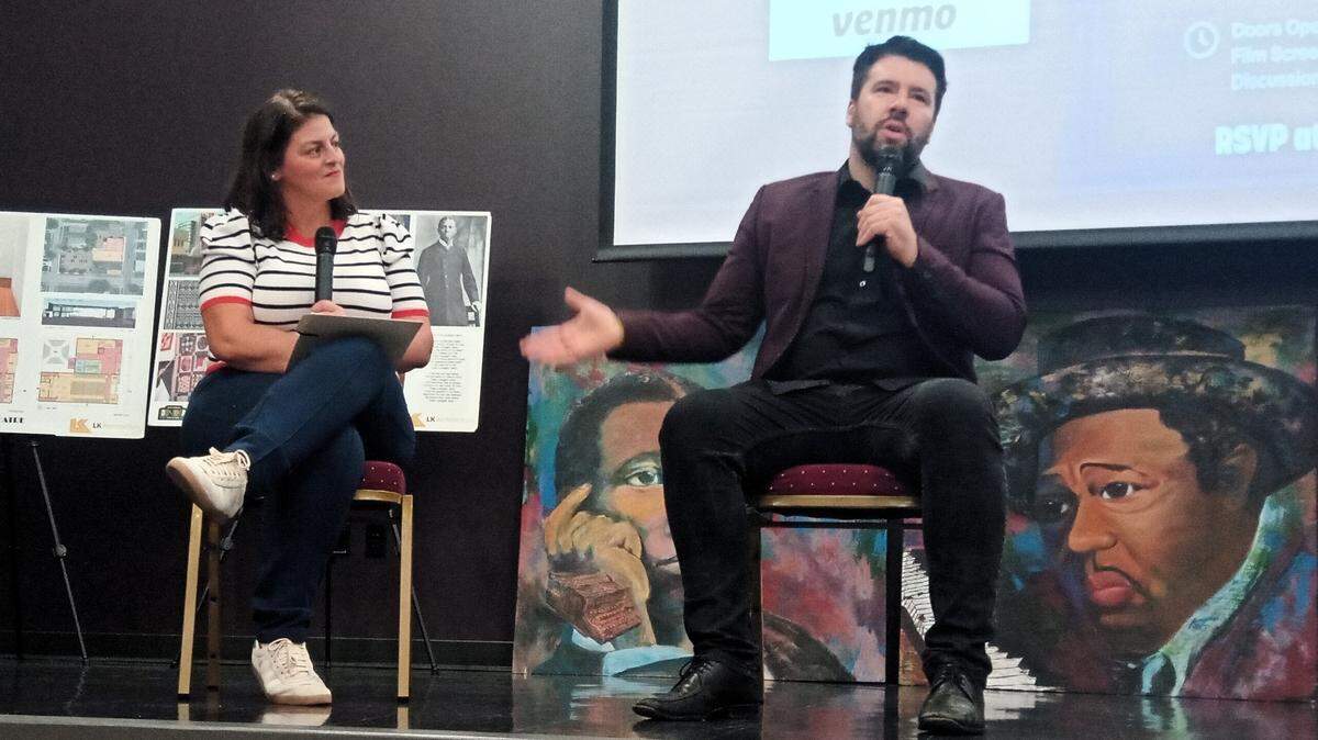 Documentary filmmaker Brian Schodorf, who grew up in Wichita, answers questions from City Council member Maggie Ballard at the Wichita premiere of his latest film, “Why Trump? Two Americas.”