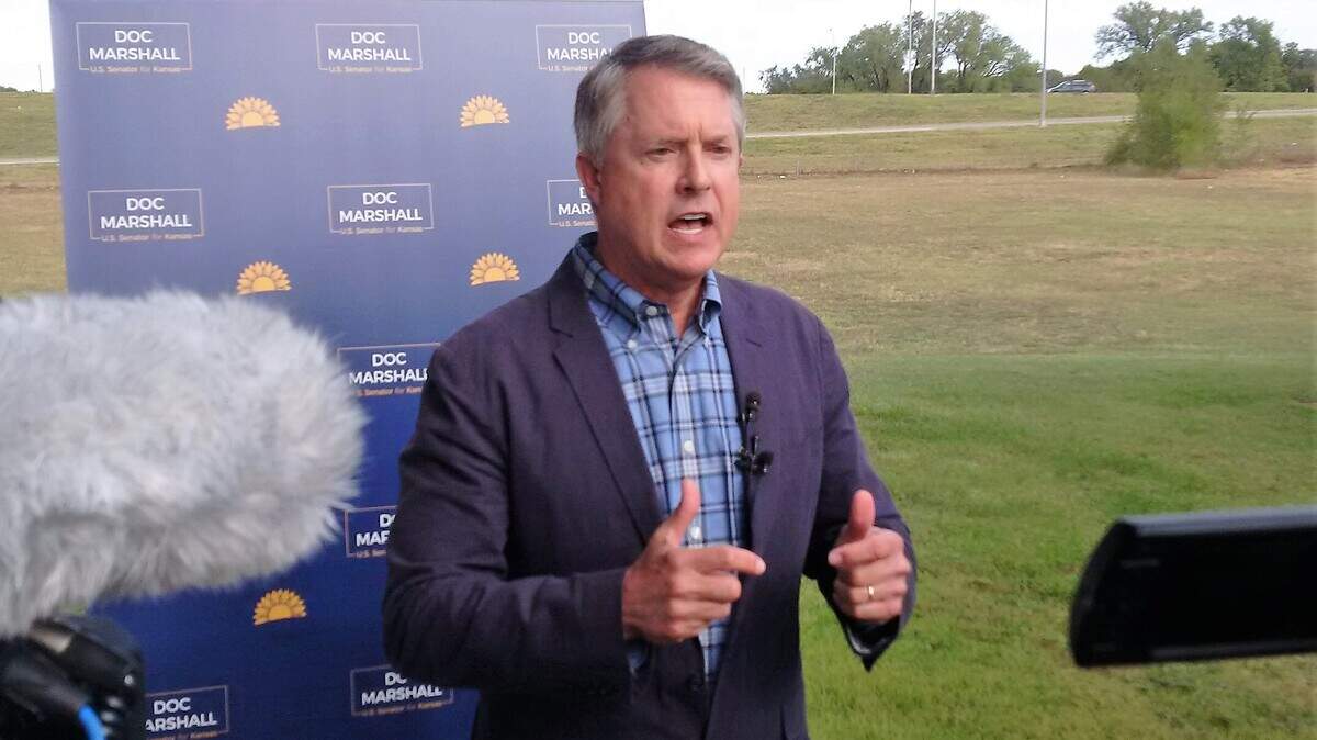 Sen. Roger Marshall answers questions from the media after meeting with aircraft union leaders concerned about a national vaccine mandate.