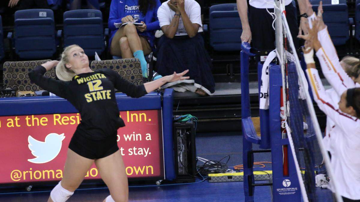 Wichita State sophomore Regan Stiawalt elevates for a swing against Iowa State last weekend. Stiawalt, a walk-on from Ness City, totaled 16 kills in two matches in her first action back from injury.
