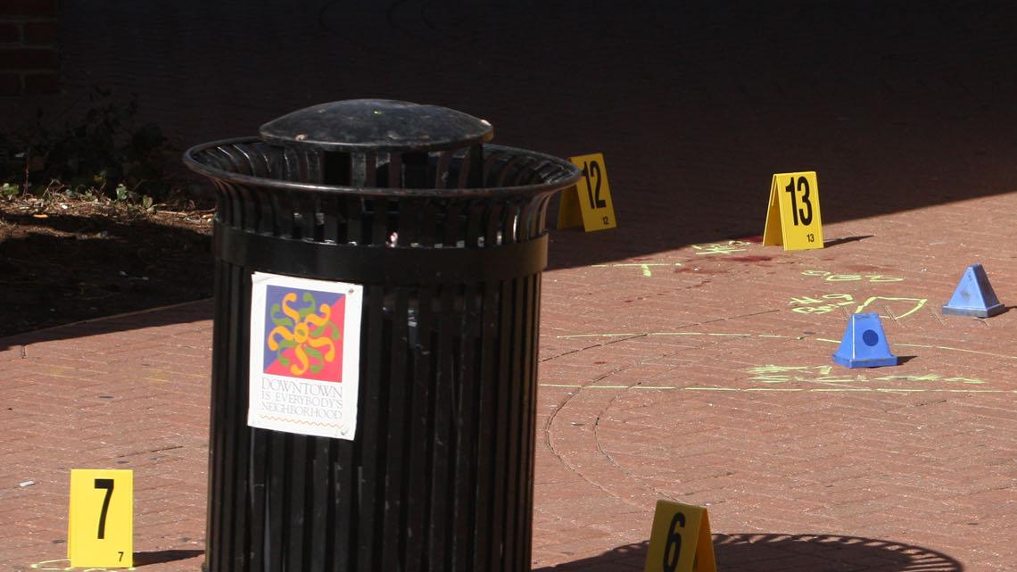 Wichita Police investigate  the area around Hotel at Old Town and the adjoining parking garage after five people were shot early this morning in the 200 block of North Mosley after a concert wrapped up at a club. Police exchanged gunfire after chasing a man into a parking garage. One person died, Lt. Randy Reynolds told The Eagle this morning. It was not immediately clear if the man police shot was the person who died. (March 10, 2012)

