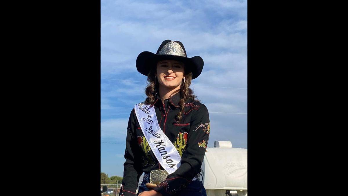 Emma Brungardt smiles while wearing her 2024 Miss Teen Rodeo Kansas sash.