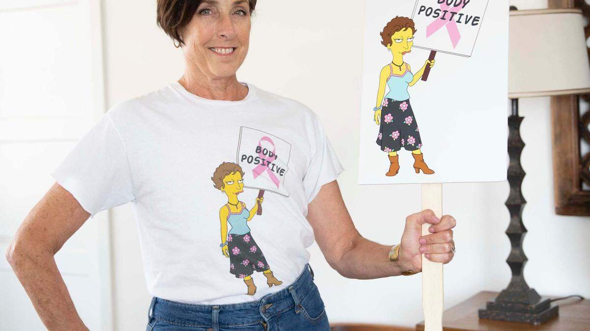 Elizabeth Hotaling works with a national group to educate women about the option of choosing to be flat rather than get implants after masectomies. The national group is led by the actor who does the voice for a one-breasted cancer survivor on The Simpsons. Hotaling made the emotional decision to go flat after implants gave her lots of physical, unhealthy problems.