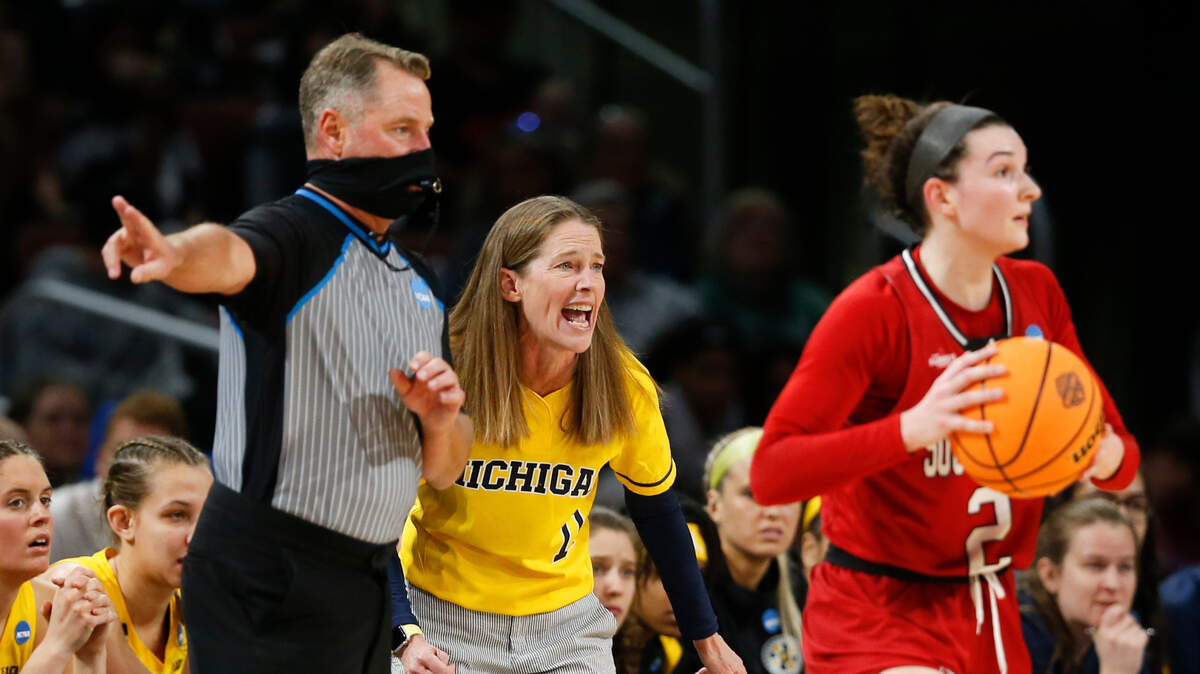 Michigan coach Kim Barnes Arico yells instructions to her team during the first half against South Dakota on Saturday.