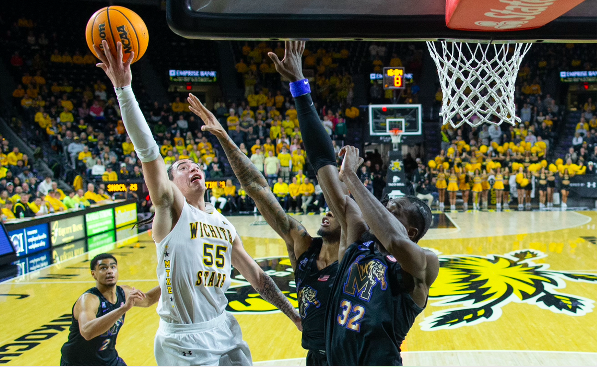 Bijan Cortes scores a basket during his career-high 13-point performance for Wichita State in an 84-79 overtime win over No. 14-ranked Memphis at Koch Arena on Sunday.
