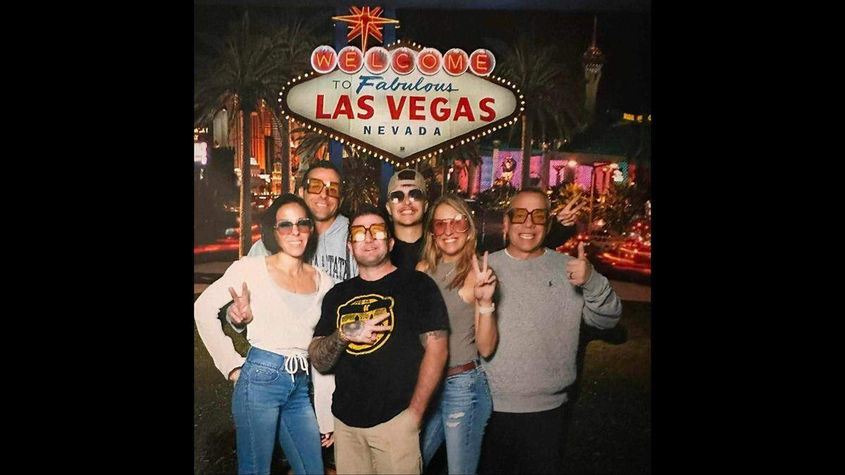 From left: Katie Partida, Michael Poland, Thomas Doyle, Caleb Poland, Melissa Steiner and K.C. Steiner. The group posed for a photo in Las Vegas in November 2023 wearing silly sunglasses Doyle bought.