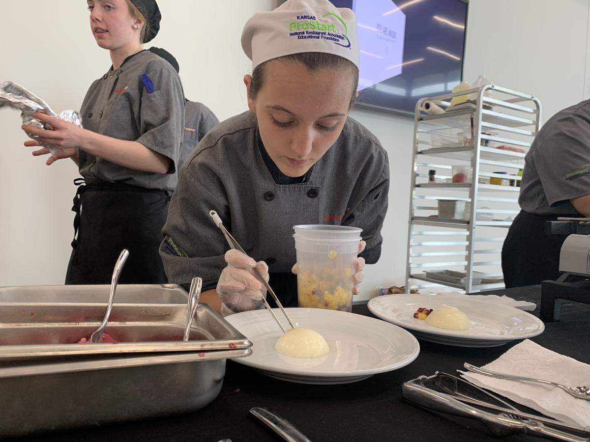 Madison Beemiller, a junior from Maize High School, is one of the students competing in the national ProStart Invitational in Washington, D.C. It’s her job to make the dessert course look perfect.