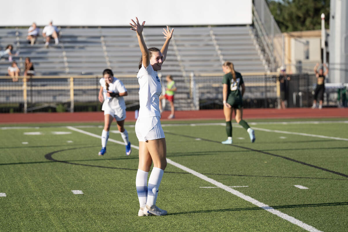 Kapaun’s Sara Claire Michaelis celebrates after scoring a goal in the second period against Bishop Carroll. Kapaun beat the defending state champs 5-3 in the girls soccer quarterfinal.