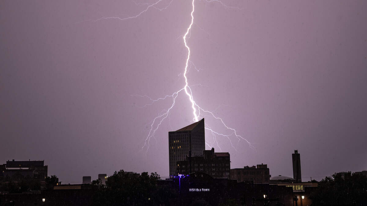 Lightning strikes over Wichita’s Epic Center building after a long day of severe thunderstorms across south central Kansas in June 2025.