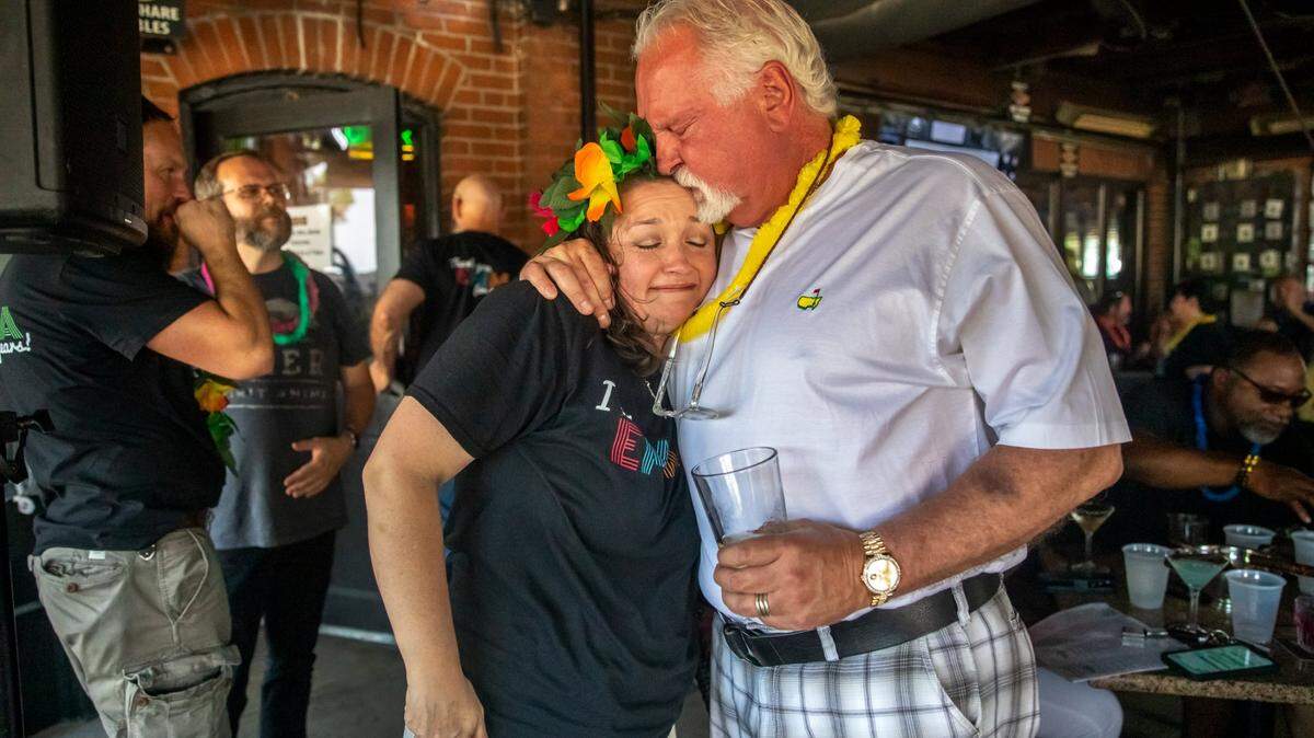 Mort’s founder and owner Morrie Sheets, right, surprised his longtime manager and Mort’s co-owner Emma Russell with a trip to Hawaii in honor of her 25th work anniversary.