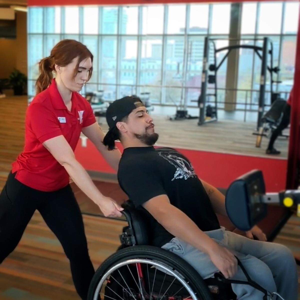 Sabrina Smith (left) and Andrew Ornelas performing an exercise at the Downtown YMCA. Smith says she was Ornelas’ personal trainer for over two years.