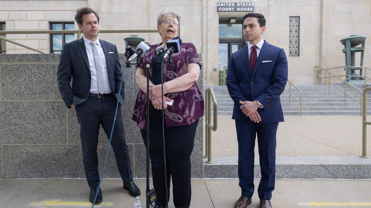 Former Marion City Council member Ruth Herbel speaks outside of the Federal Courthouse in downtown Wichita on Wednesday after she and her attorneys filed a federal lawsuit against the city of Marion and several current and former officials over a police raid of Herbel’s home and the newsroom of the Marion County Record last August.