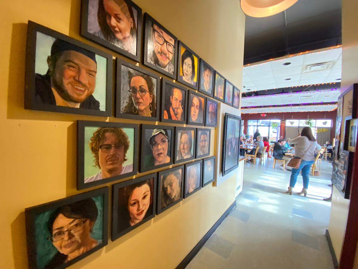 Tanya’s Soup Kitchen owner Kelly Rae Leffel just hung 20 portraits she commissioned of current and former staff members.