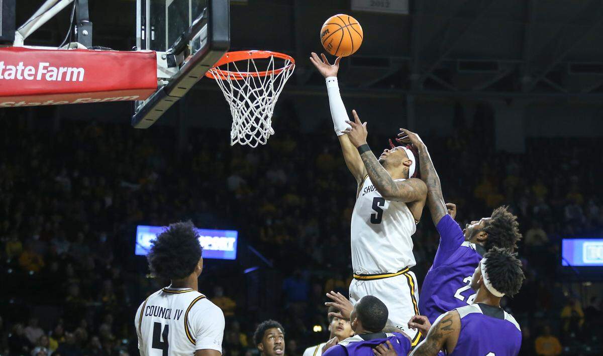 Wichita State’s Monzy Jackson puts back a missed shot after previous chasing down a loose ball during the first half of their game against Prairie View A&M on Wednesday night at Koch Arena.