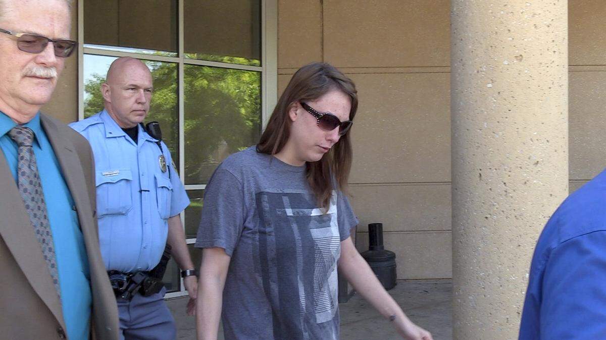 Emily Glass walks out of the Sedgwick County Jail a couple of hours after District Attorney Marc Bennett announced there are currently no charges being filed in the case of Lucas Hernandez. (May 30, 2018)
