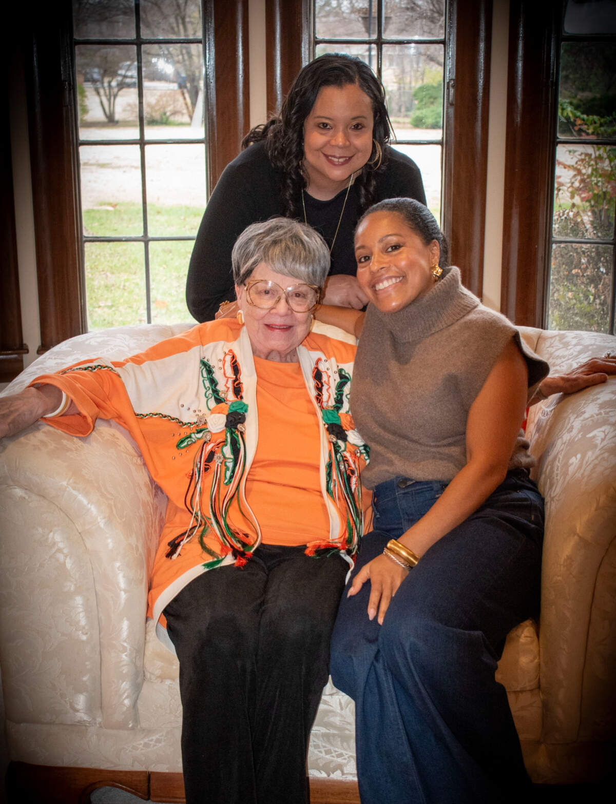 Jo Brown with her granddaughters, Trecy Brown, standing, and Sheinelle Jones, seated at right.