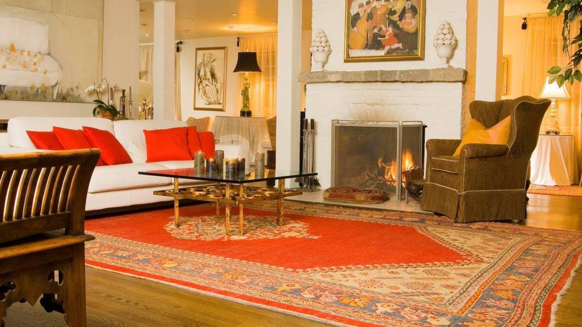 Two years after selling his Rug Studio at Maple and Ridge Road, Philip Holmes said the person who bought his business abandoned it.