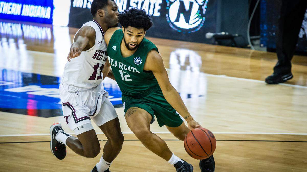 Trevor Hudgins drives to the basket during the 2021 NCAA Division II men’s basketball national championship game. He and the Bearcats will play for another title on Saturday.