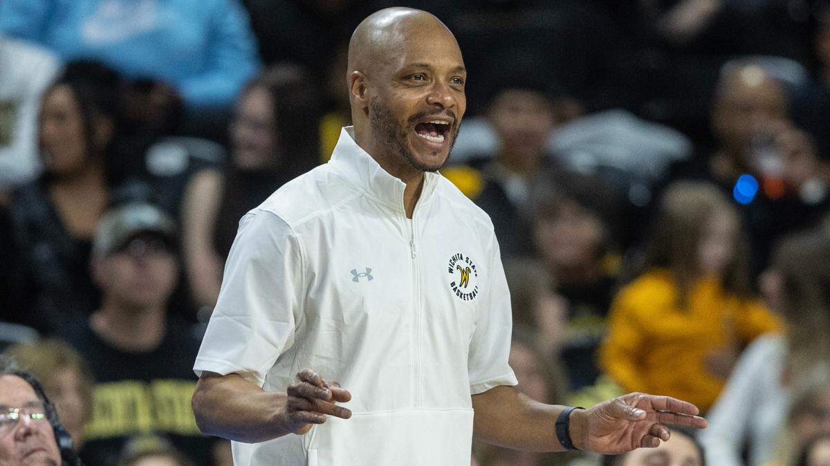 Wichita State coach Isaac Brown gives instructions to his team during the second half against South Florida on Sunday. It was WIchita State’s final regular season game.