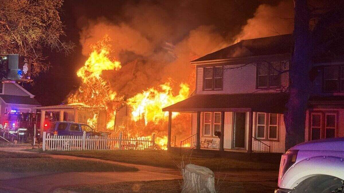 A person and a dog died in an early morning house fire in Hutchinson on  Friday. 