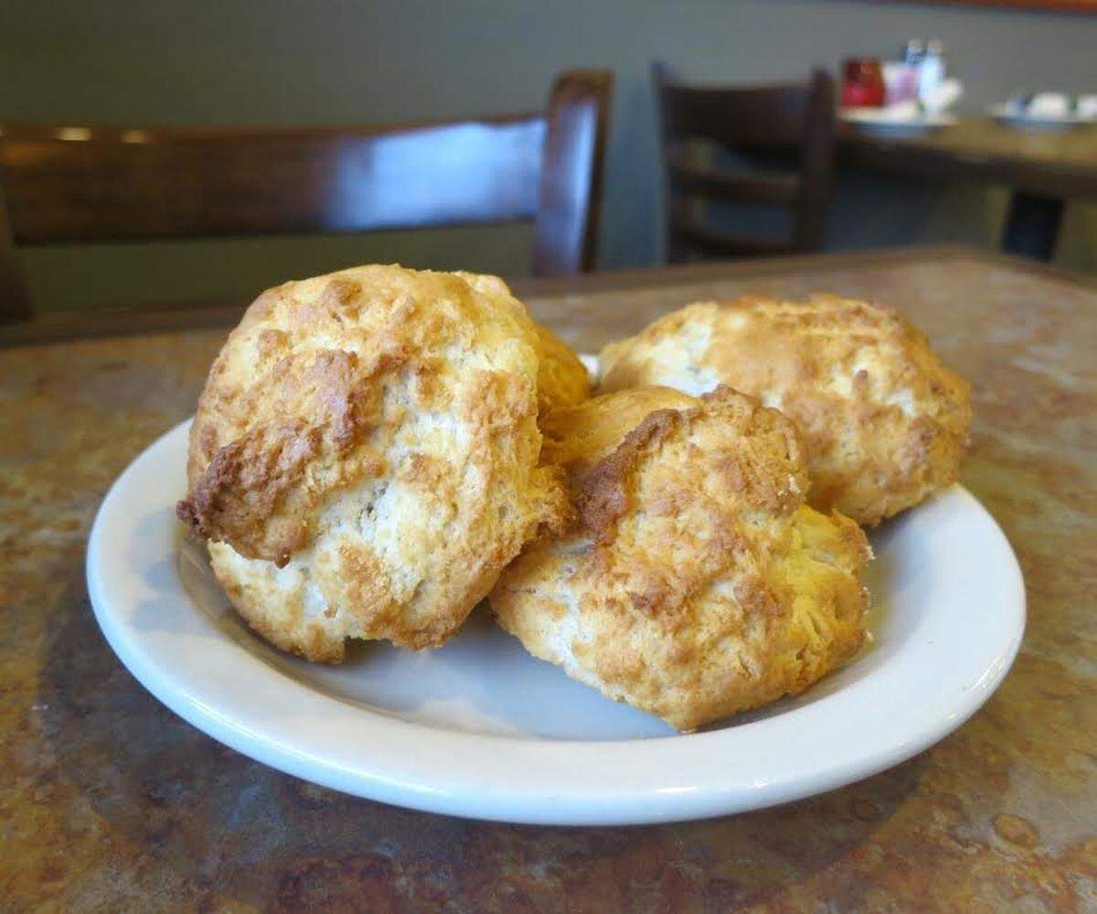 Le Monde Cafe at 602 N. West St. has long been known for its crumbly biscuits, above, its fattouch salad and its gyro.