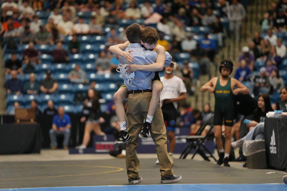 Carroll freshman Parker Landers after winning the Class 5A state title at 106 pounds, closing at 37-3 overall.
