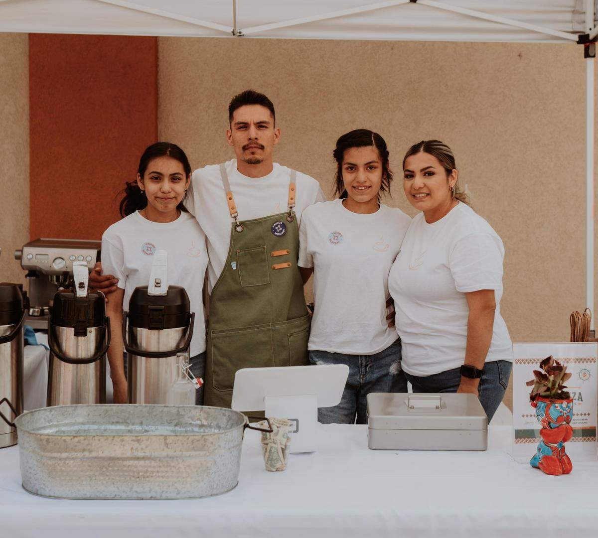 Esperanza Coffee Roasters owner Oscar Pineda, second from left, is pictured with daughter Yoselin Pineda, left, daughter Brisa Pineada, third from left, and wife Vanessa Pineda, right.