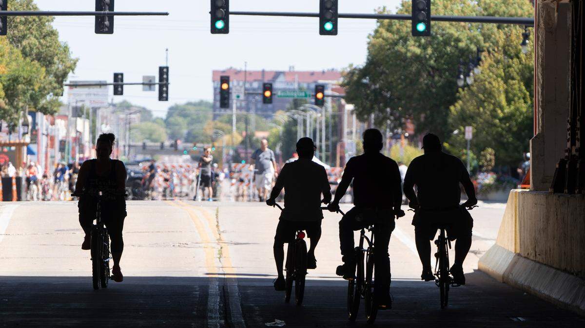 Pedestrians, bikers, skaters, one-wheelers and more made their way under the overpass on Douglas near Washington during Open Streets ICT in 2022.