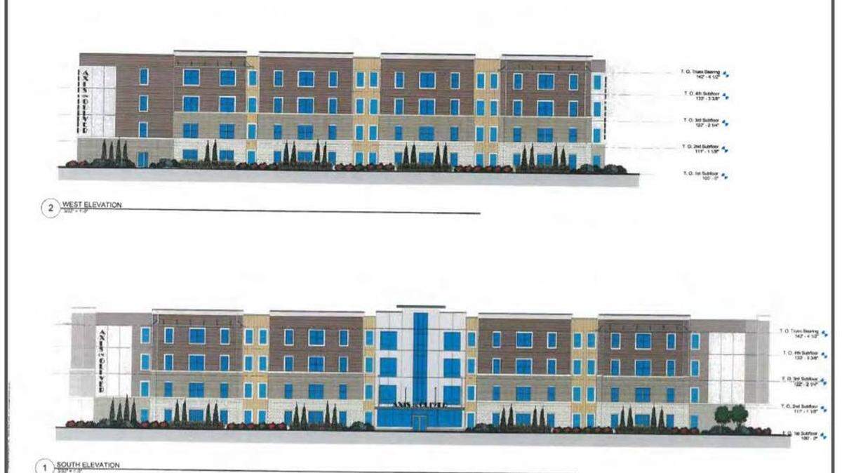 This drawing shows a four-story apartment building proposed near Wichita State University. The building approved by the Wichita City Council will be six stories instead of four.