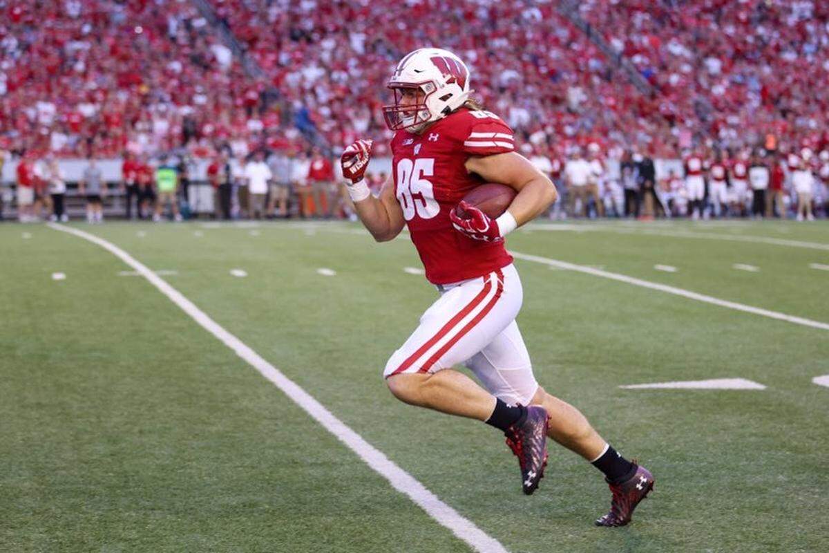 Wichita native and Bishop Carroll graduate Clay Cundiff hauls in a pass for the Wisconsin football team.