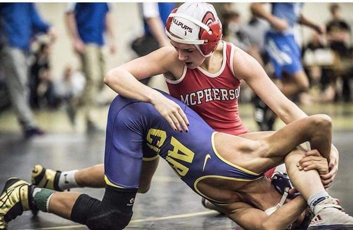 McPherson senior Mya Kretzer won the 126-pound Kansas high school girls wrestling state championship Saturday.