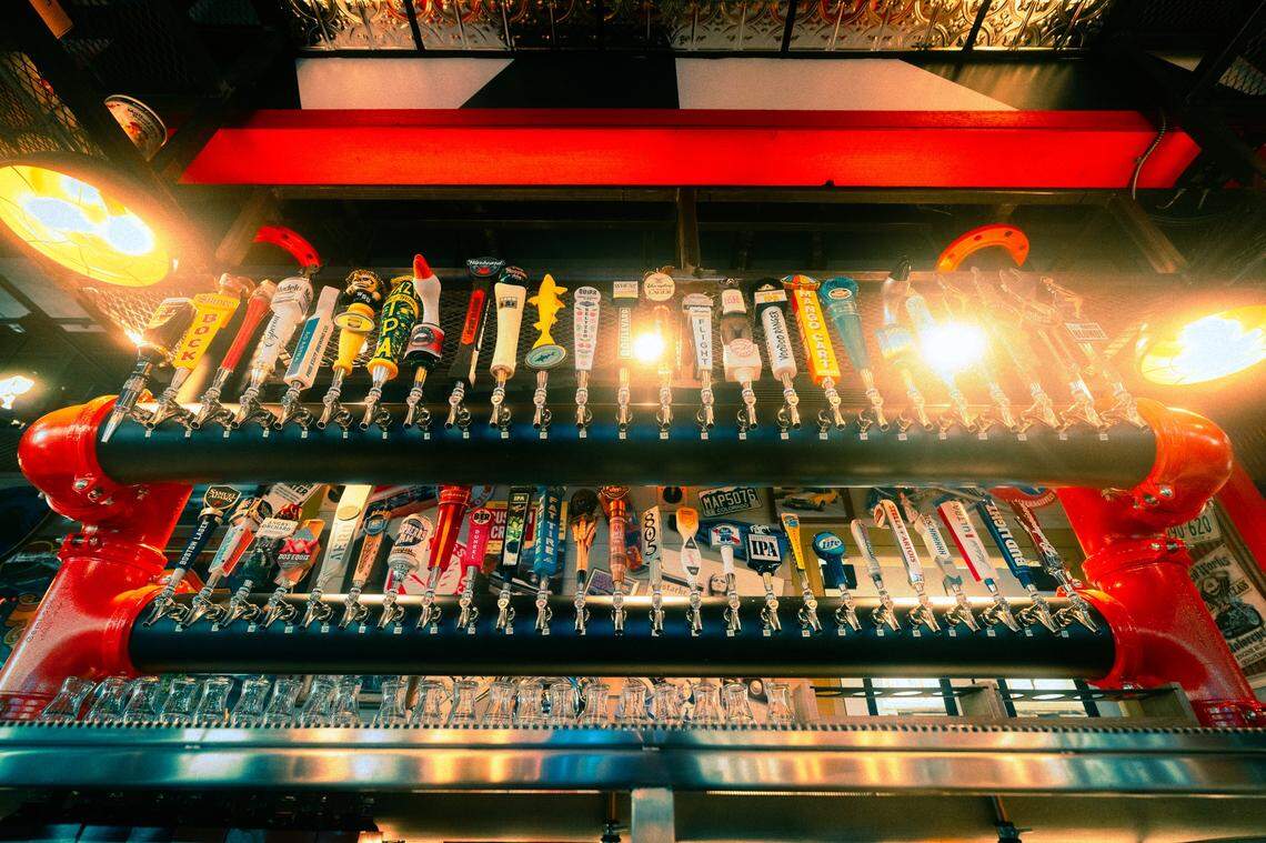 The bar at Sickies Garage offers 50 different kinds of beer on tap.