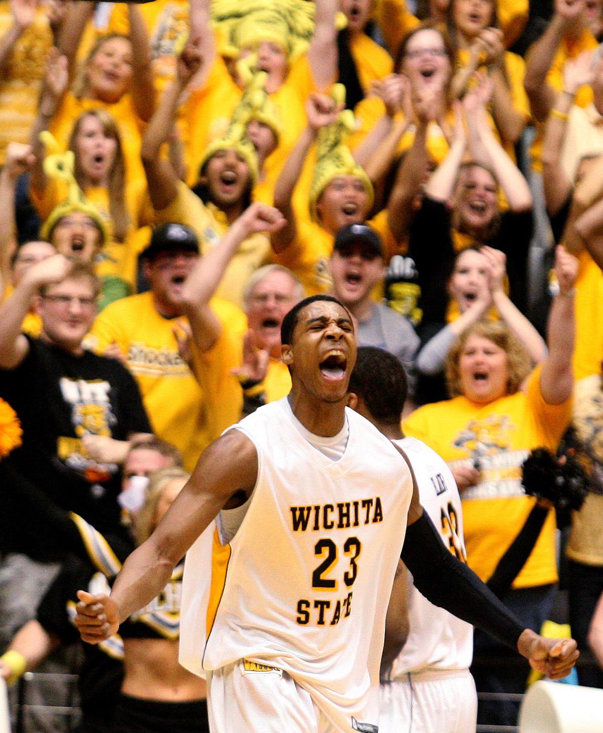Wichita StateÕs Toure Murry celebrates with the fans at the NIT quarterfinals in New York.