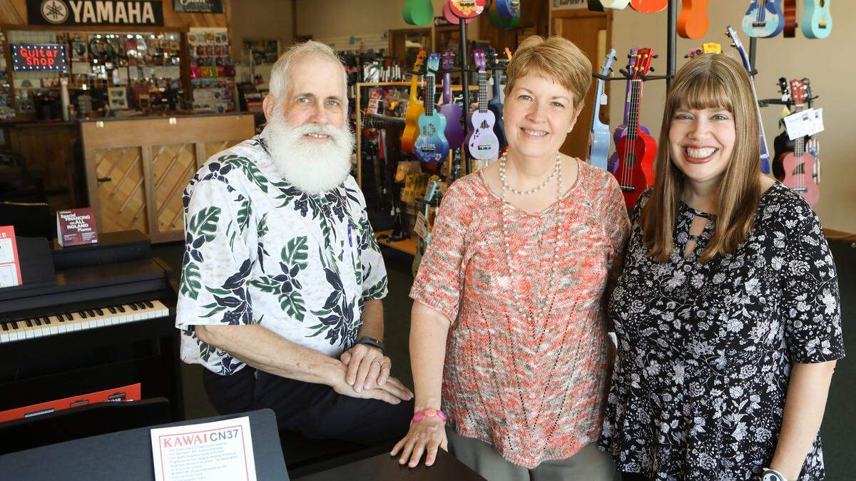 Garten’s Music and the Wichita Music Academy owners Michael and Cindy Houston and their daughter Amy Houston.
