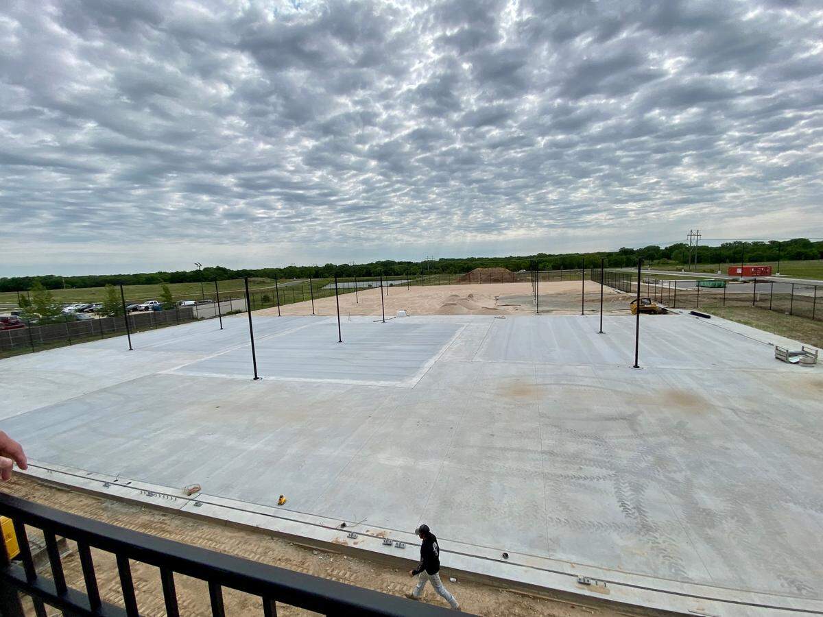 The acreage behind The Sandbox in Derby will include pickleball courts and sand volleyball courts, which also can be used for “beach” weddings.