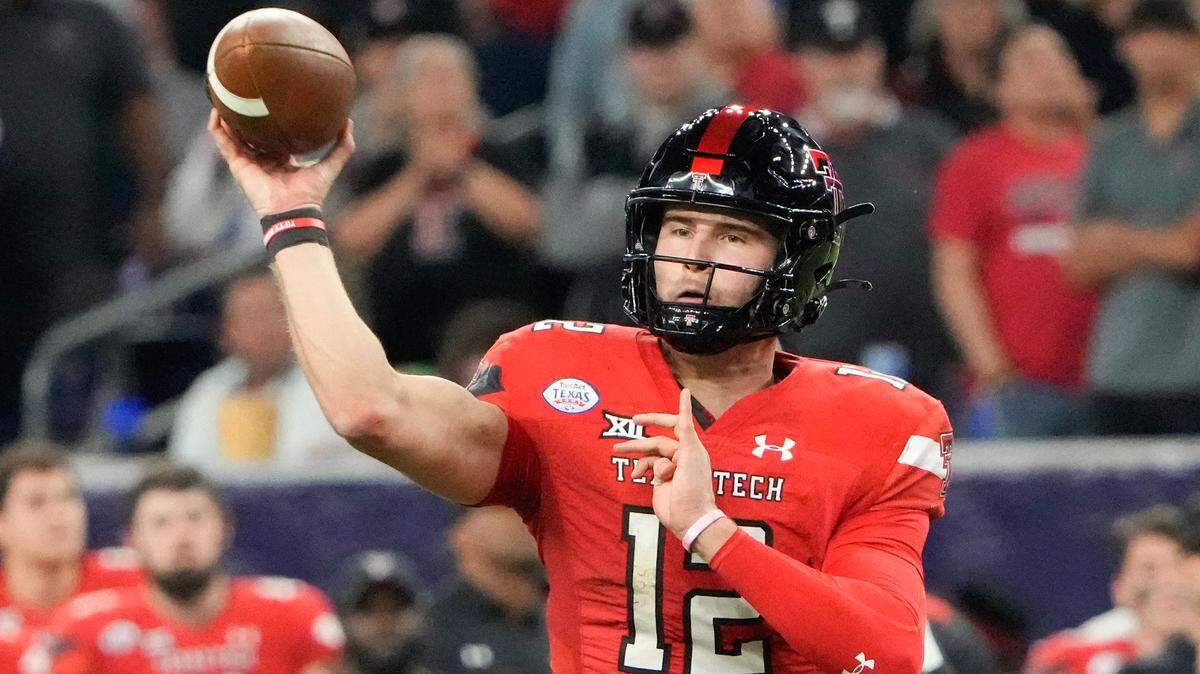 Texas Tech Red Raiders quarterback Tyler Shough passes against the Mississippi Rebels in the first half of the 2022 Texas Bowl at NRG Stadium.