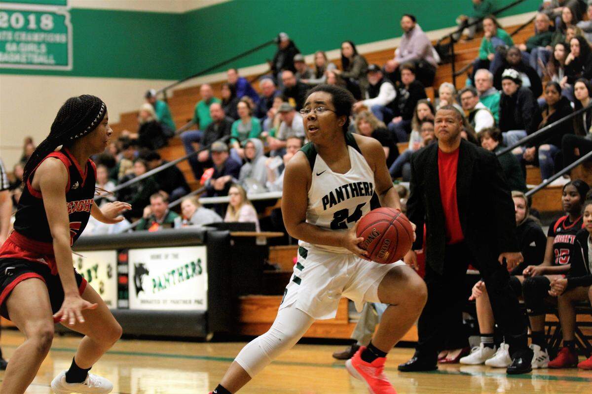 Derby senior point guard Tor’e Alford delivers a step back during the Panthers’ 66-52 win over Wichita Heights on day one of the AVCTL/GWAL Challenge. (Jan. 10, 2019)