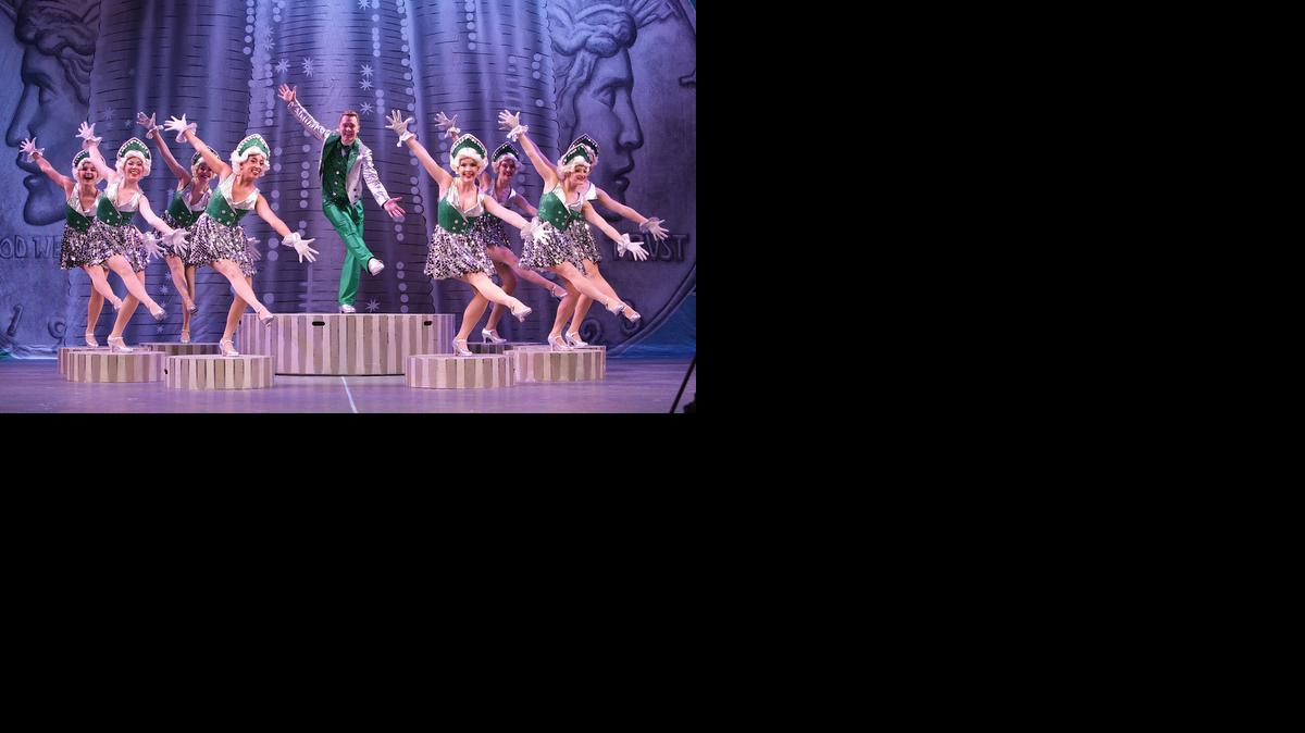 Billy Lawlor (Shonn Wiley) leads the tapping ladies in “We’re in the Money” in “42nd Street.”