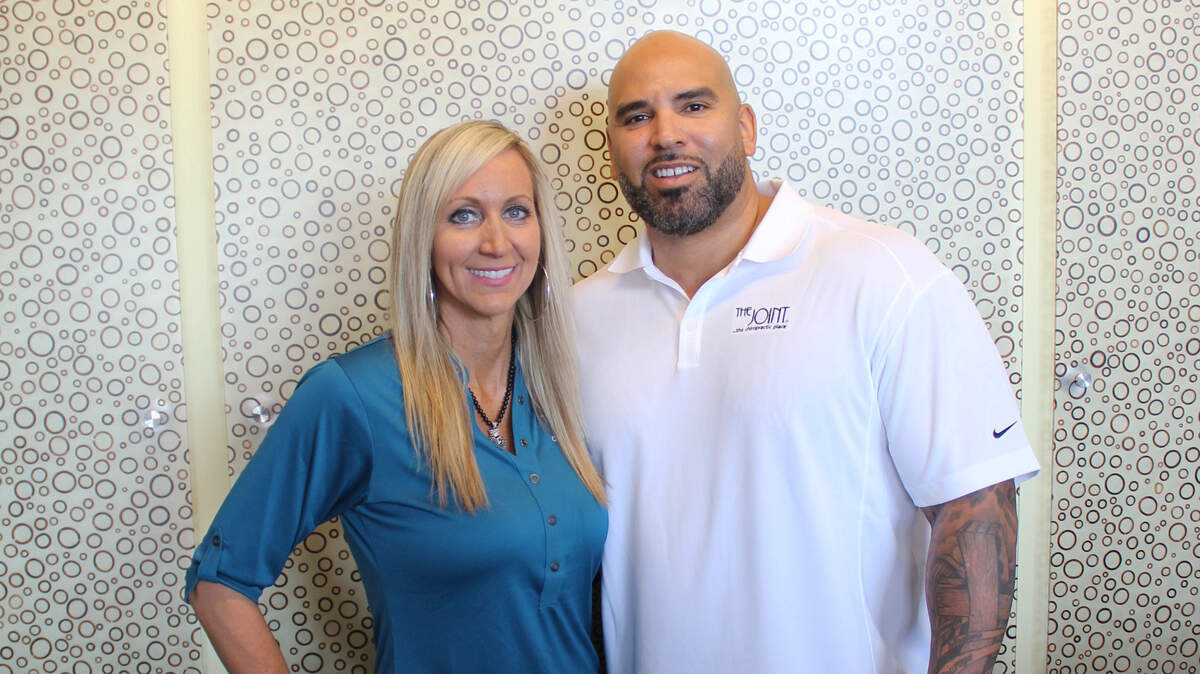 Monique and Roger Haynes-Robertson, in a photo from when they opened their first Joint Chiropractic at NewMarket Square in 2016, are preparing to open their second on the east side.