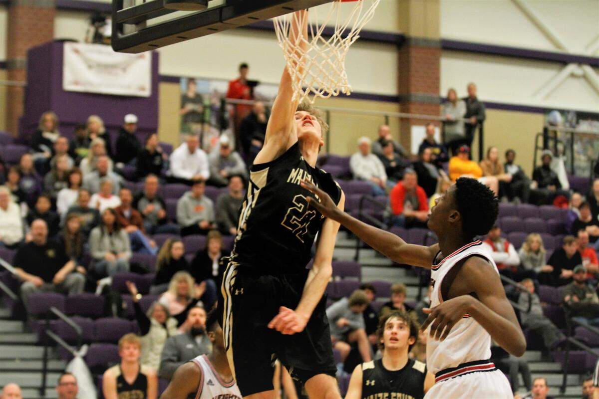 Maize South senior center Kael Kordonowy throws down one of his five dunks in the Mavericks’ 66-50 win over Wichita Heights in the championship game of the 2019 Valley Center January Jam on Saturday. (Jan. 19, 2019)