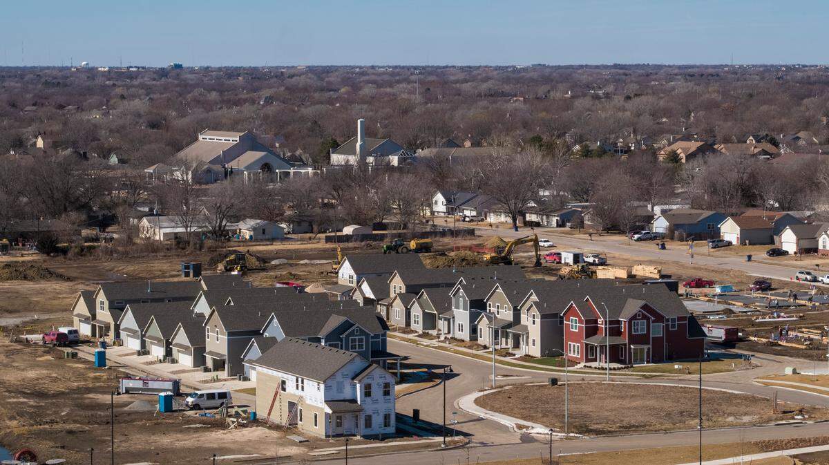 Heritage Commons, which is known as a neotraditional neighborhood, is a new neighborhood in Andover that features maintenance-free yards and houses that are very close together — much like row houses or townhouses in a larger city — with garages that are mostly behind the houses.