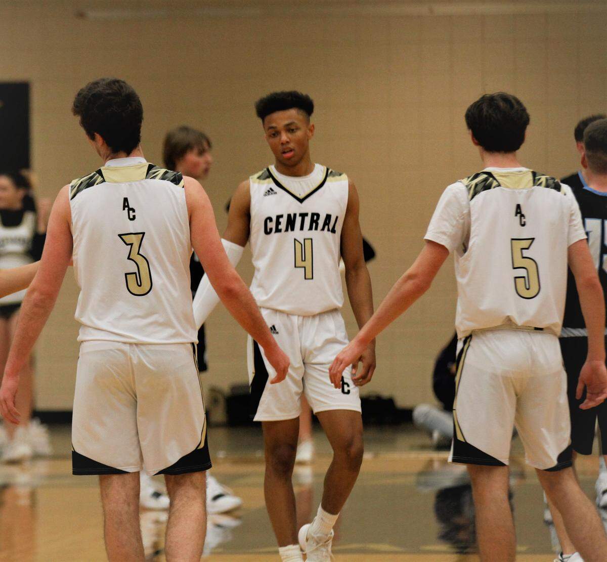 Andover Central’s Easton Leedom (left), Xavier Bell (center) and Braden Belt (right) all average about 15 points a game for the Jaguars. (Feb. 5, 2019)